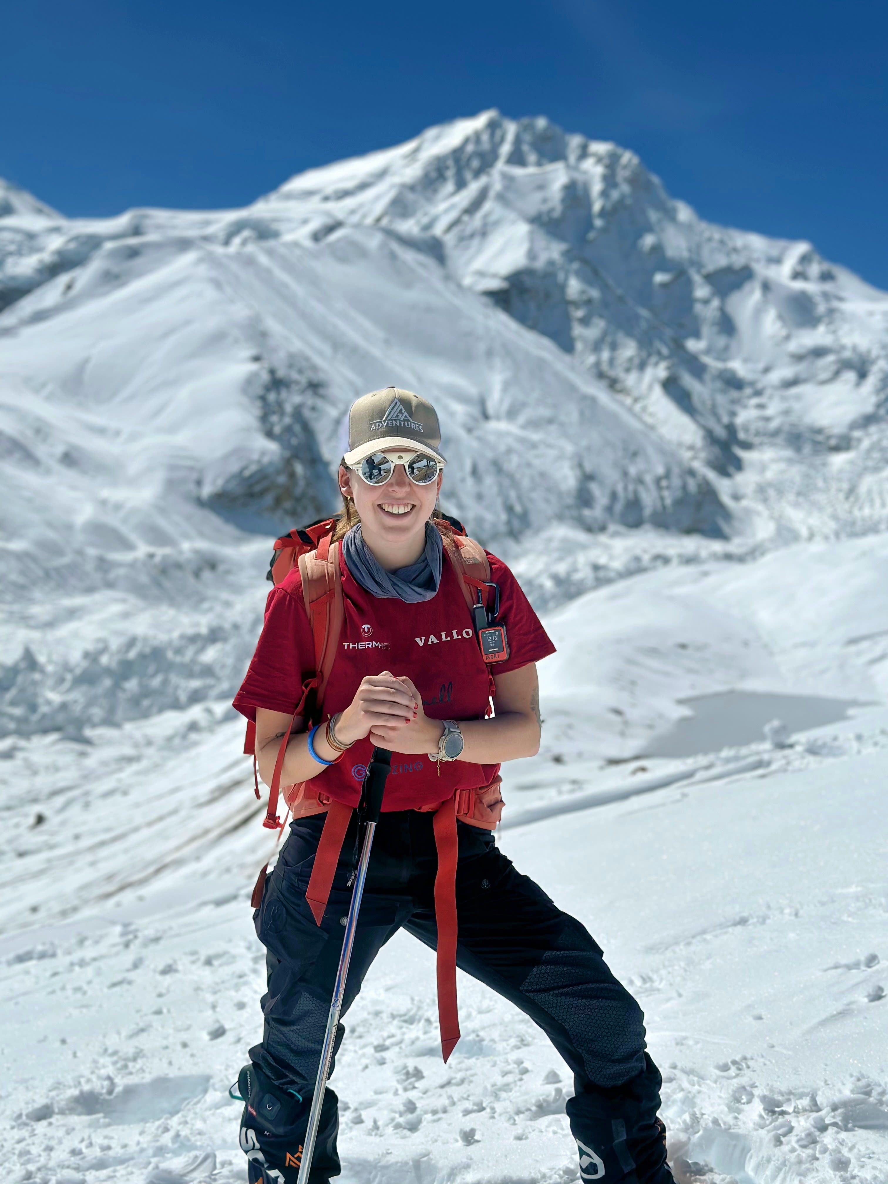  Adriana Brownlee at the top of a snowy mountain