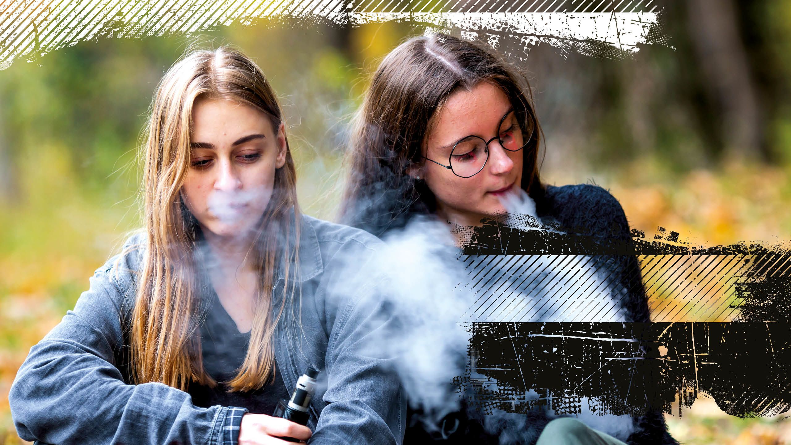 Two female teenagers vaping