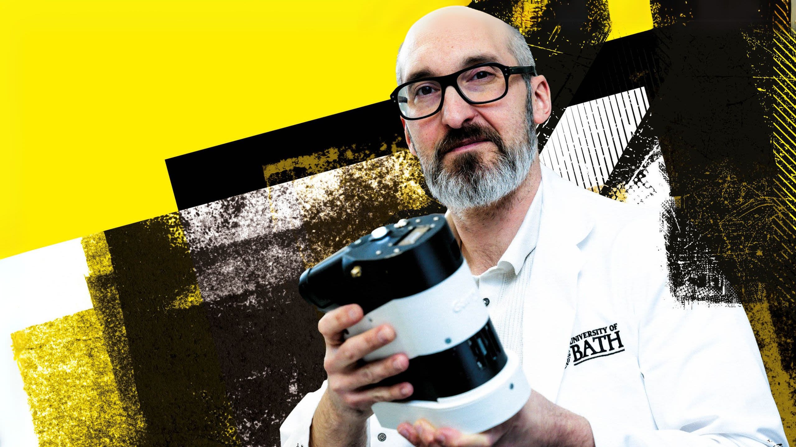 Professor Chris Pudney holding the spice detection device