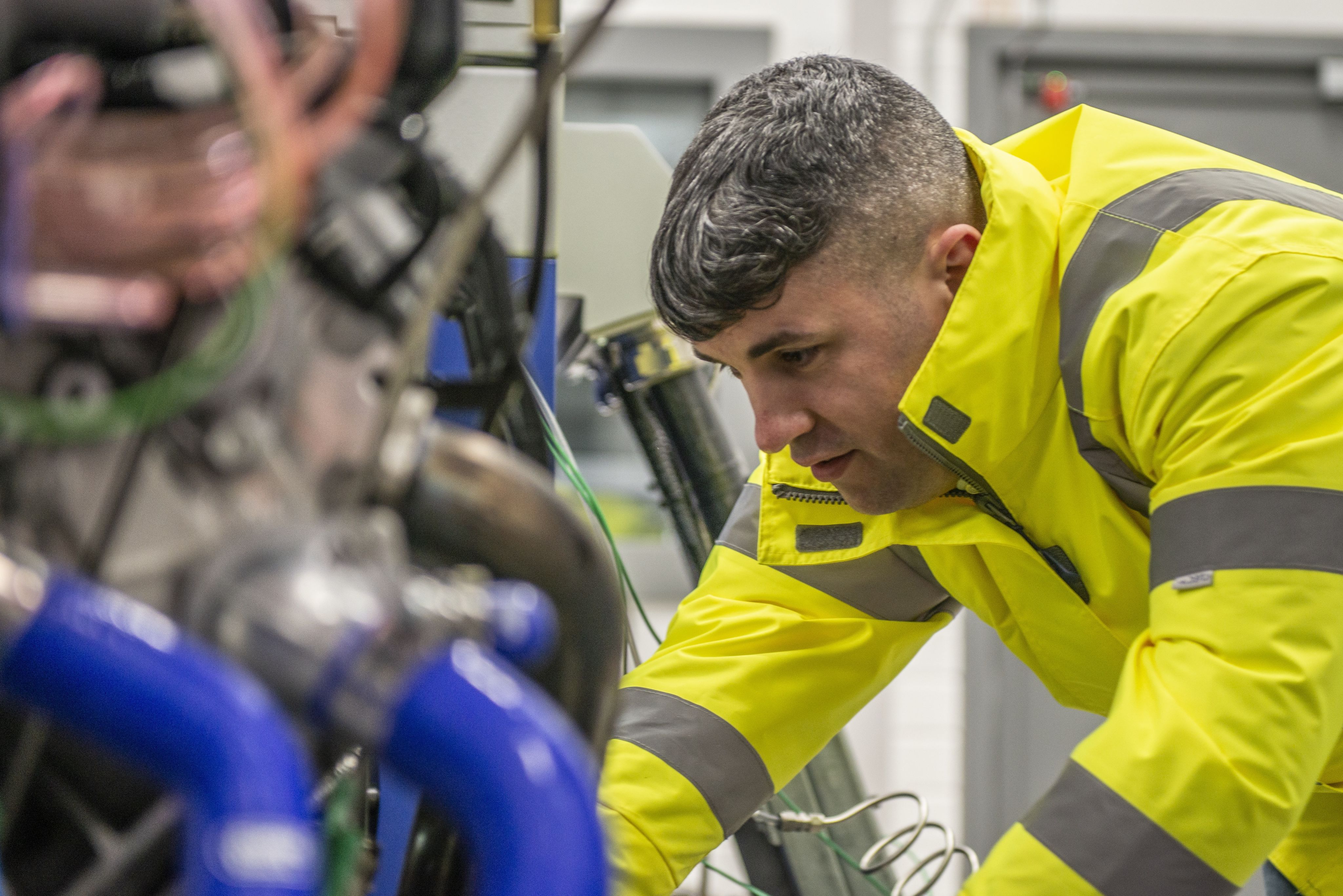 A technician working in the IAAPS labs